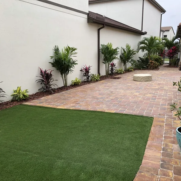 Courtyard pavers and artificial turf
