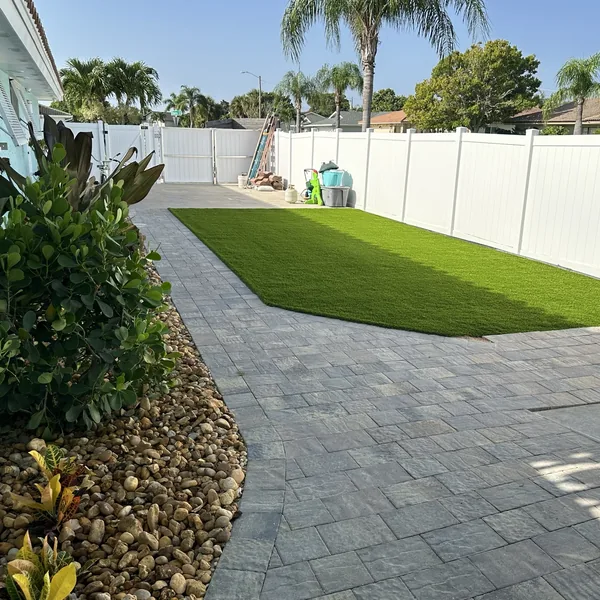 Artificial turf with paver walkway